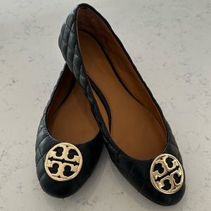 Tory Burch Black quilted flats with gold emblem
